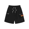 2024 shorts d'été maillots de bain imperméables et à séchage rapide designer femmes blanc noir lettre colorée shorts de plage maillots de bain pour hommes pantalons de plage de natation pour hommes