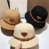 Cappello da bacino sagomato lavorato a maglia autunno e inverno del designer di marca cappelli da pescatore con cintura a triangolo rovesciato europeo e americano alla moda 294v