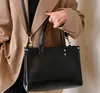Çanta Ladies Lüks Çantalar Tasarımcı Mini Çanta Boş Zamanlı Seyahat Şerit Çanta Tote Deri Malzeme Moda Omuz Çantası Cüzdan1