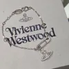 Designer Viviene Westwoods New Viviennewestwood Western Empress Dowager Pin Saturn Armband Female Minority Design Feel Fold Paper Clip Armband rakt