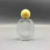 En gros 30ML bouteille de parfum en verre ovale de luxe vide portable recharge de parfum bouteille de parfum flacons de pulvérisation cosmétiques