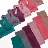 Pantaloni fitness a vita alta set da donna pantaloni da yoga ad asciugatura rapida per sollevare la pancia pantaloni da corsa primaverili ed estivi dimagranti dell'anca color pesca