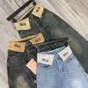 Jeans femininos de strass vintage com bainha Miu espessada e folgada, mostrando magreza e arrastando no chão 2023 outono e inverno novo estilo