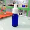 Bottiglie di vetro con contagocce da 600 pezzi 30 ml 5 ml 10 ml 15 ml 50 ml Bottiglie di liquido per e-liquid Olio essenziale Bottiglia di vetro blu con Rubbe233i a prova di bambino