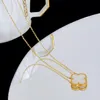 Collana con ciondolo di design Lucky Clover per donne ragazze in oro 18 carati acciaio al titanio semplice classico bianco nero fiore di lusso croce catena girocollo collane gioielli regalo