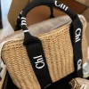 2Size Woody Tote Straw Beach Designer Bag Raffias Liten Basket Shopper Luxurys Handväska Helgväskor Kvinnor Mens Clutch Shoulder Crossbody Lady Weave Travel Påsar