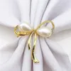 냅킨 링 6pcs 황금 귀여운 진주 활 모양 웨딩 파티 테이블 장식 부엌 용품을위한 서브 테트 버클 2522