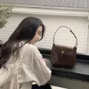 Sacs à bandoulière coréen Moda pour femmes, sac sous les bras en cuir véritable, sacs à main avec boucle dorée