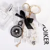 Partihandel 20st Keychains Bow-Knot Imitation Pearl Parfym Crystal Bottle Iron Tower Chain Car Key Ring Bag Charms Accessories Girl Keyring Pendant Gift 2023