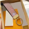 Designer Keychains Multicolor Key Chain High Quality 1:1 Women Men Brown Leather Bag Wallet Lanyard Plated Gold Accessories Dragonne