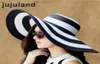 Jujuland 2018 Nuevo Verano Mujer Sombreros para el sol Sombrero de visera de ala grande Negro Blanco Sombrero de paja a rayas Gorras de playa al aire libre ocasionales para mujeres C1902024357