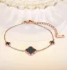 Korean Version of 18k Rose Gold Fourleaf Clover Bracelet for Girls Black Epoxy Titanium Steel Jewelry4569973