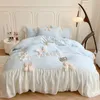 Set di biancheria da letto Principessa coreana Fiocco in pizzo Set Bellezza Tinta unita Volant Copripiumino Ragazze di lusso Matrimonio Tessili per la casa 231211