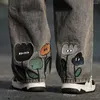 Jeans masculinos perna reta solta streetwear largo com bordado floral dos desenhos animados cintura elástica profunda para moda