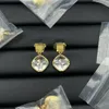 New inlaid rhinestone flower design Ear Stud luxury and versatility Beautiful brass earrings Designer Jewelry European and American runway style brass material