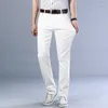 Mäns jeans 2024 Spring Autumn Fashion Business Comant Stretch Straight Ben Pants Mane White Denim Trousers