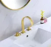 Badrumsvaskkranar lyxiga toppkvalitet borstade guld mässingskran 3 hål 2 handtag bassängblandare kran design koppar