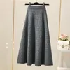 Skirts Elastic High Waist Knitted Skirt Women Autumn And Winter Fashion Plaid Solid Color A-line Bag Hip Long Skirt 231211