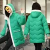 Kvinnors dike rockar mellan längd av bomullskläder sömmar huva jacka kvinnor trendiga ins vinter 2023 lös tjock koreansk stil yttre slitage