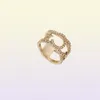 2022 Doskonała jakość pasma urokowa Pierścień Hollow Design with Blowly Diamond w 18 -karatowym złotym Gold For Women Wedding Jewelry Prezent B6209948