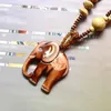 Kedjor Bohemian Wood Harts Halsband Kvinnors etniska stil Retro Elefant Beaded Pendant Sweater Chain Accessories