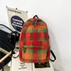 School Bags Korean plush backpack women's luxury designer handbag wallet 2023 new polyester imitation cashmere striped flat shoulder 231211