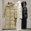 Chaqueta larga gruesa de plumón de pato blanco 95 de gama alta para exteriores para mujer, abrigo de invierno ultralargo del Noreste, novedad de invierno de 2023