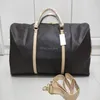 Bolsas de Duffel Travel Tootes Designer Mulheres Bolsa de Bolsa de Big Capacidade Homem de Alta Qualidade Men Garamente Bolsa de ombro Cruzada273K