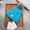 top designer beanie Plush ball head Luxury knit hat design hat Warm breathable exquisite Hat trend autumn winter Elegance versatile Casual fashion warm gift