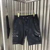 Herr shorts designer cinessd sommar mode personlighet triangel märke avslappnad multi-pocket arbetskläder 2023 snörning lös yk0v