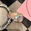 Hårklämmor Barrettes Designer Brand French Miu Letter Water Diamond Love Acicic Acid Duck Mouth Clip Light Luxury mångsidig sidobang Tillbehör för kvinnor II6L