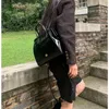 Skolväskor Korea Autumn/Winter Kvinnors ryggsäck Retro Ins Oil Wax Leather Shooth Bag Travel Bagpack Black Commuter Rucks Sac