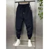 Pantaloni da uomo invernali in piumino di cotone ispessito Cargo Trend tasche grandi che indossano pantaloni termici maschili 2023