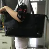 2017NUOVO famoso marchio di fabbrica nero shopping panno impermeabile classico borsa da viaggio da donna casual cucitura inferiore PU borsa moda borsa casual