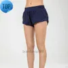 lu-16 Faixa de verão que 2,5 polegadas Hotty Hot Shorts soltos respiráveis de secagem rápida calças esportivas femininas de ioga saia versátil casual bolso lateral