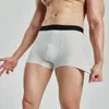 Shorts masculinos fitness alta elasticidade gelo malha olhos respirável secagem rápida super sem costura designi calças de dois quartos. Foto
