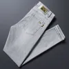 Mäns jeansdesigner Summer Thin Light Colored For Men's Elastic Slim Fit Casual Washed and Ground White Pants 71FB