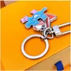 Designer Unisexe Key Portefeuille Luxury Brand Puzzle Friends Metal Keychain Pendant Cartoon Car Cavyring Key Chain's Men's Women's Bag Totes Pendant Charms Gift L455