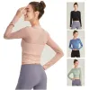 Sportoberteile für langärmlige Yoga-Outfits für Damen, solide, sonnencremefarbene, atmungsaktive Fitnesskleidung. Das Netz zeigte seinen Nabel, Rundhals-Lauf-Fitness-Tops