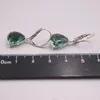 Boucles d'oreilles pendantes en argent sterling 925 véritable avec billion de cristaux verts de 3 cm de longueur