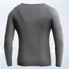 Ropa interior térmica para hombres Ropa interior térmica para hombres Calzoncillos largos finos Otoño Invierno más camisa de fondo cálido de terciopelo Moda masculina con cuello en V Tops sin costuras Camiseta 231211