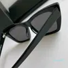 夏の光沢のある黒い灰色の猫の目サングラスサンスガラスの女性ファッションサングラスシェード