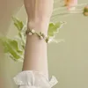 Link-Armbänder Linglan Flower Handgefertigtes Süßwasserperlenarmband mit einem Nischendesign, das sich leicht, luxuriös und exquisit anfühlt