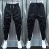 Calças de brim masculinas primavera outono preto listra jogger sweatpants homens ao ar livre casual magro harem calças streetwear alta qualidade designer calças q231213