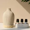 Diffusori di oli essenziali Diffusore di olio Fragranza Cera ceramica Mini umidificatore ad ultrasuoni alla moda per soggiorno camera da letto di casa 231212