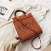 Designer spring new texture style small square fashion hand messenger women's bag Handbags Outlet310H