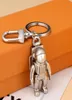 Fashion Stylish Luxury Designer Keychain Classic Key Buckle Astronaut Pendant Matte Silver Keychains for Mens Womens Bag Pendant206317116