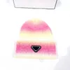 Lüks örme şapka marka tasarımcısı Beanie cap unisex takılmış şapka unisex% 100 kaşmir mektup gündelik kafatası şapkası açık moda yüksek kaliteli üçgen imza şapka