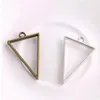 100 pièces Style Vintage Bronze argent alliage Triangle charmes colle creuse blanc pendentif plateau lunette charmes pour la fabrication de bijoux 39x25m253f