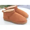 Tofflor 2023 barn småbarn baby designer skor chesut päls glider fårskinn shearling klassisk ultra mini boot size 21-35 barn